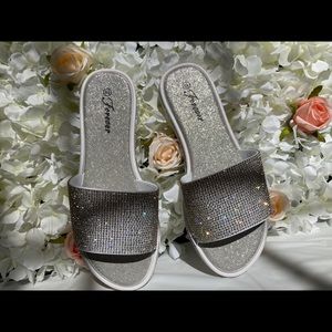 silver rhinestone covered slide sandals